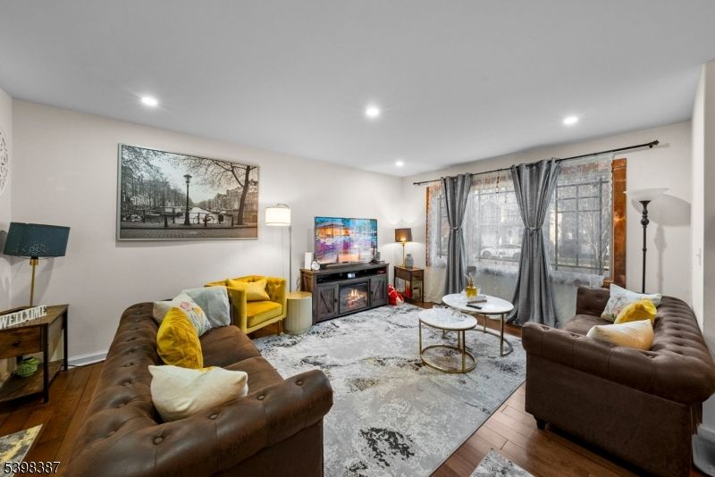 Fireplace, Interior, Living room, Recessed Lighting, Wood Texture Flooring