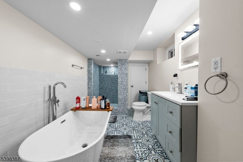 Bathroom, Dual Sink Vanities, Free Standing Baths, Glass Shower, Interior, Recessed Lighting