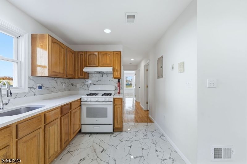 Interior, Kitchen, Marble, Marble Walls, Recessed Lighting, Wood Texture Flooring