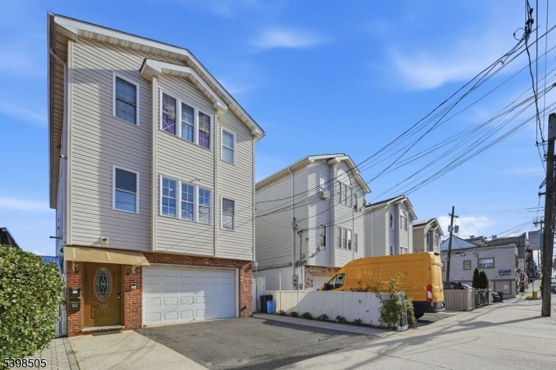 Attached, Exterior, Facade, Brick Facade, Rowhouse