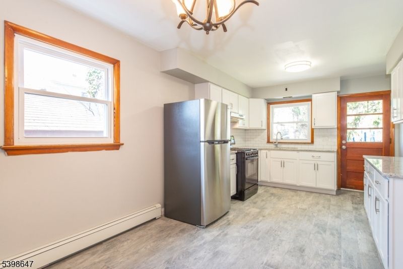 Chandelier, Interior, Kitchen, Stainless Steel Appliances, Wood Texture Flooring