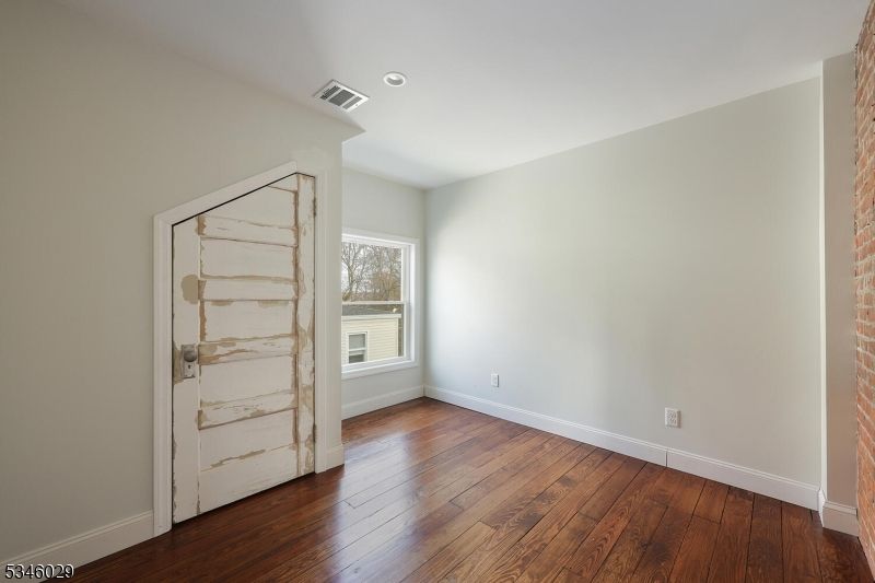 Empty room, Interior, Recessed Lighting, Stone Walls, Wood Texture Flooring
