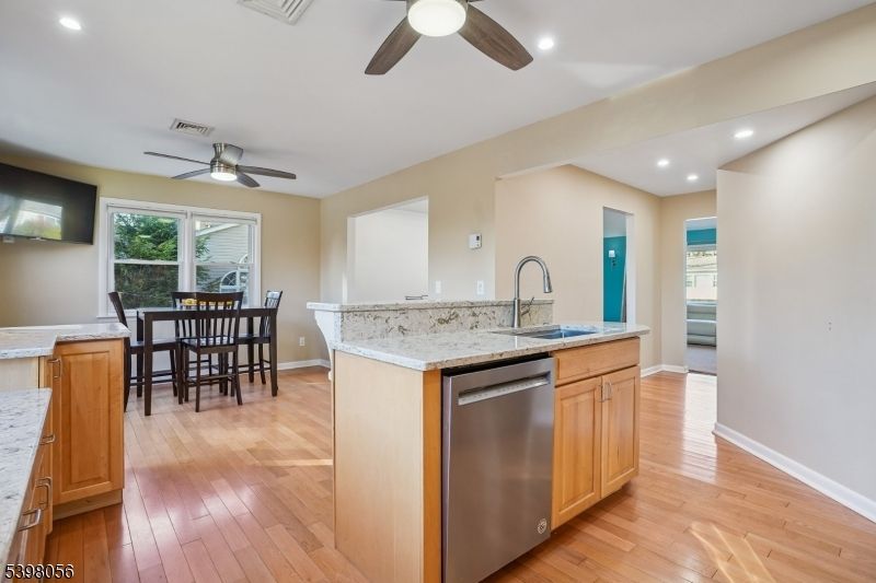 Dining room, Interior, Kitchen, Recessed Lighting, Stainless Steel Appliances, Wood Texture Flooring