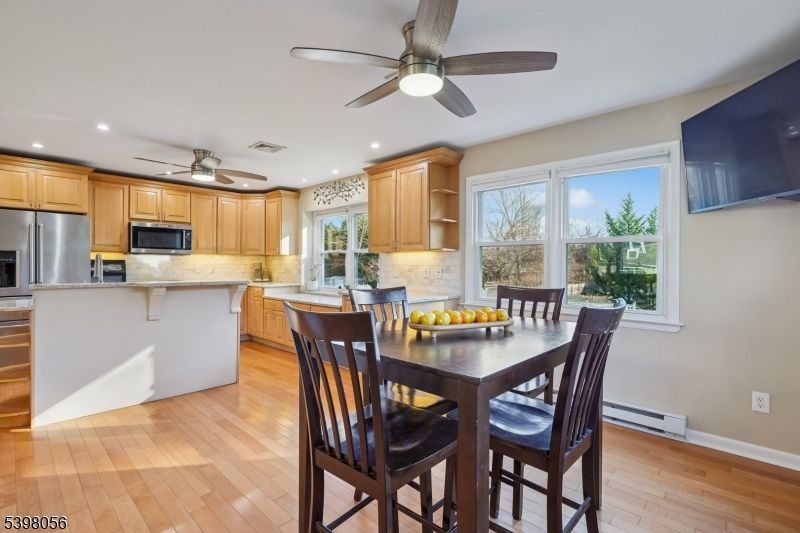 Dining room, Interior, Kitchen, Recessed Lighting, Stainless Steel Appliances, Wood Texture Flooring