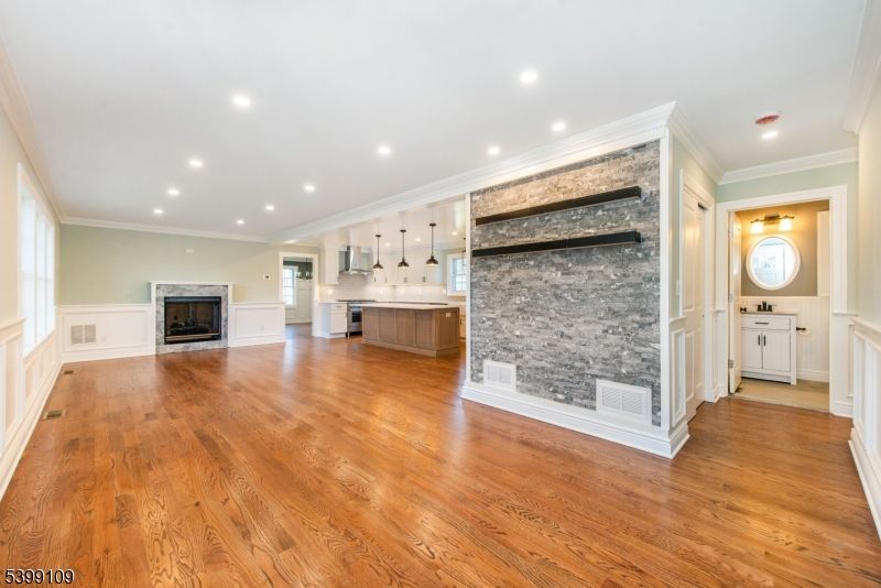 Empty room, Fireplace, Interior, Kitchen, Recessed Lighting, Wood Texture Flooring