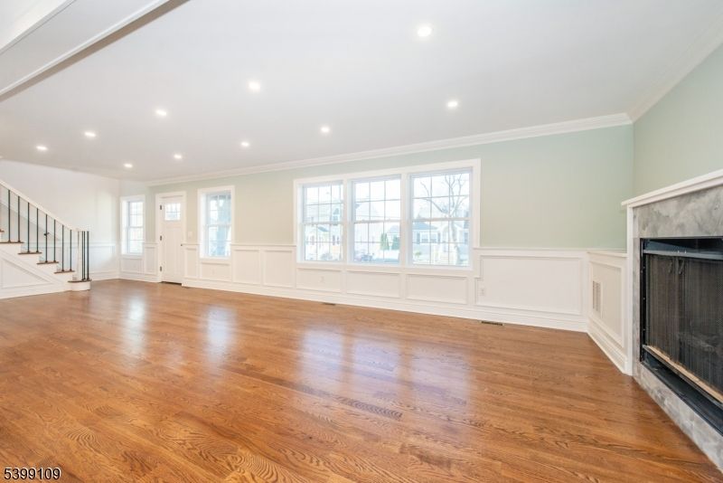 Empty room, Fireplace, Interior, Recessed Lighting, Wood Texture Flooring