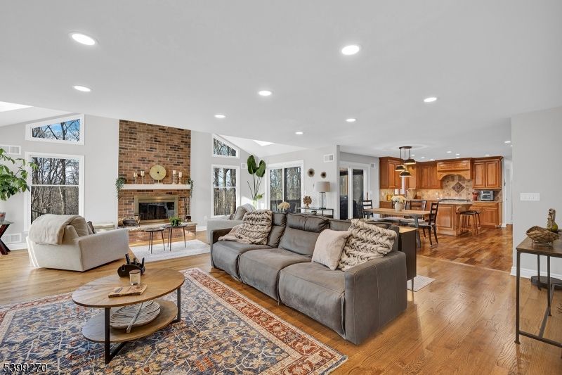 Dining room, Fireplace, Interior, Kitchen, Living room, Pendant Lights, Recessed Lighting, Stone Walls, Wood Texture Flooring