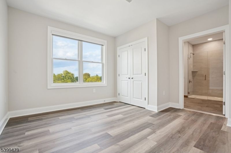 Bathroom, Empty room, Glass Shower, Interior, Recessed Lighting, Wood Texture Flooring