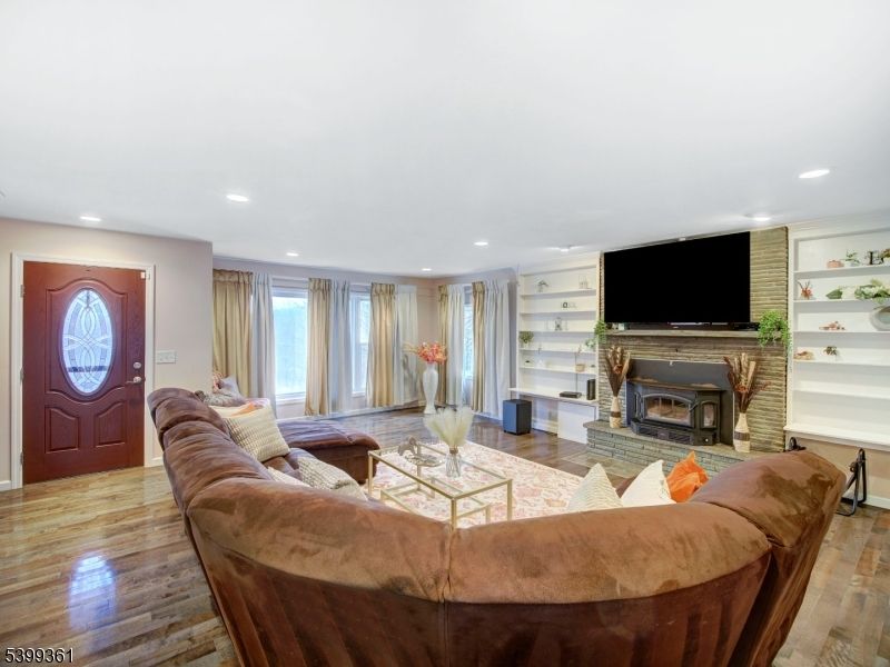 Fireplace, Interior, Living room, Recessed Lighting, Wood Texture Flooring