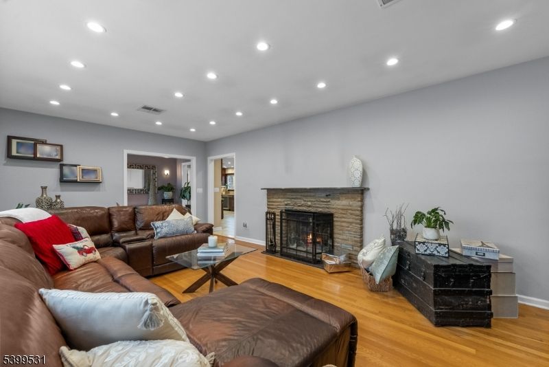 Fireplace, Interior, Living room, Recessed Lighting, Wood Texture Flooring