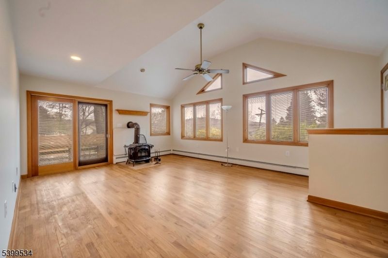 Empty room, Fireplace, Interior, Recessed Lighting, Wood Texture Flooring