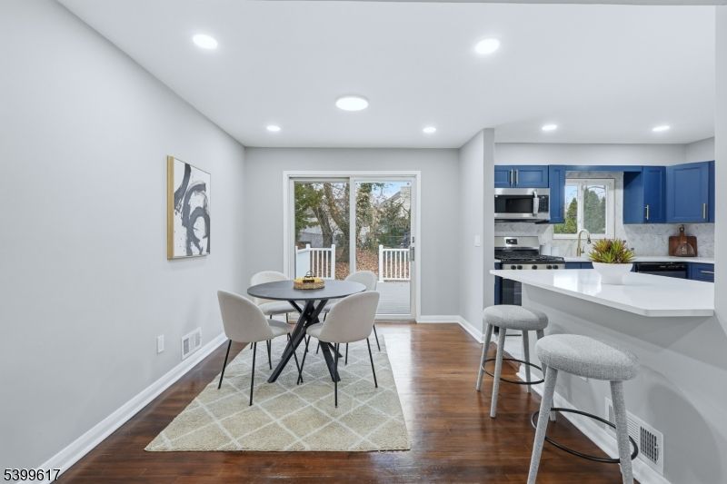 Dining room, Interior, Kitchen, Recessed Lighting, Stainless Steel Appliances, Wood Texture Flooring