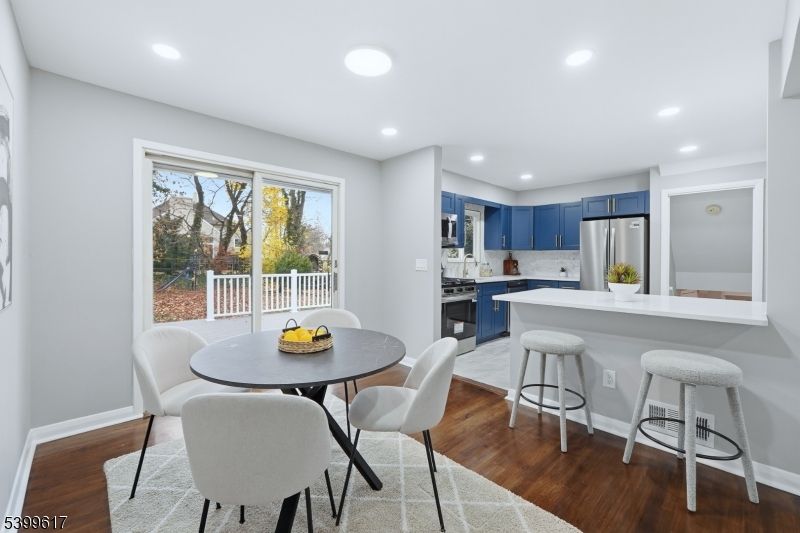 Dining room, Interior, Kitchen, Recessed Lighting, Stainless Steel Appliances, Wood Texture Flooring