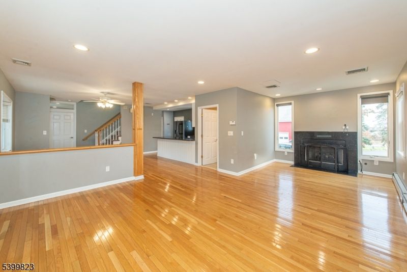Empty room, Fireplace, Interior, Recessed Lighting, Wood Texture Flooring