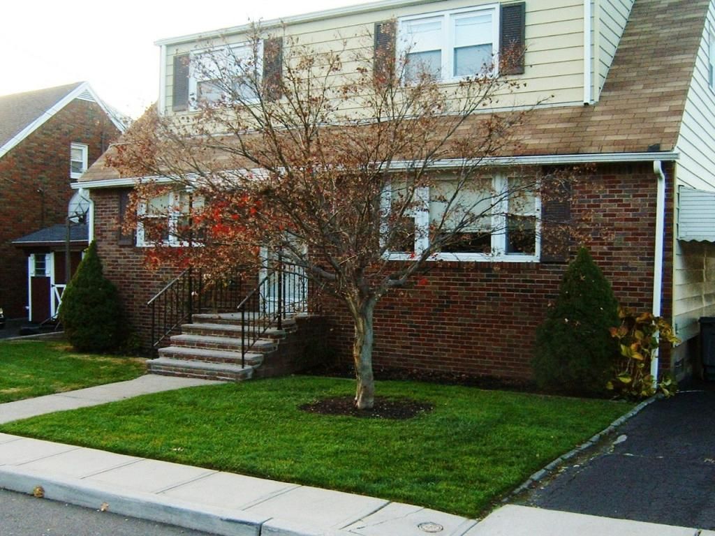 Exterior, Facade, Brick Facade, Cape Cod