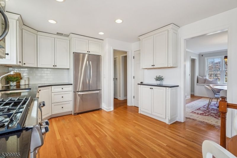 Dining room, Interior, Kitchen, Recessed Lighting, Stainless Steel Appliances, Wood Texture Flooring