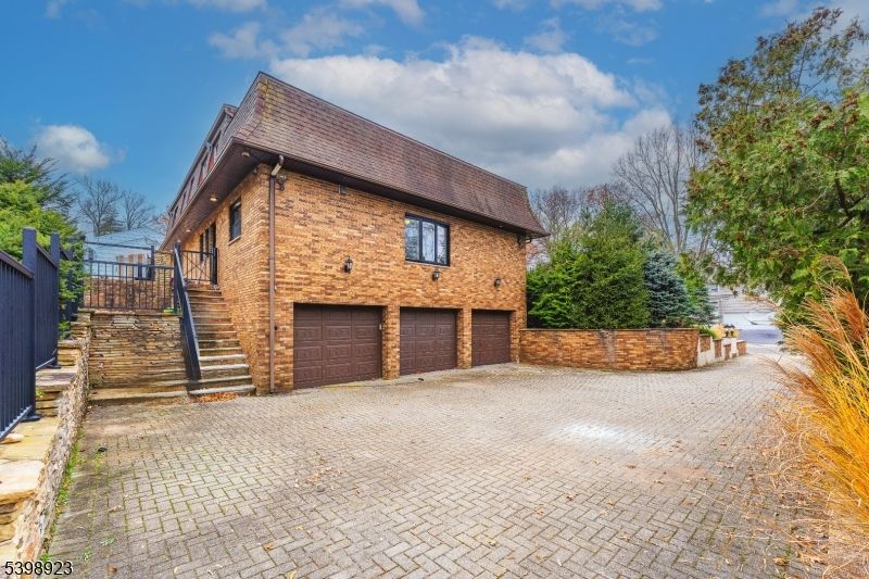 Attached, Exterior, Facade, Brick Facade, None