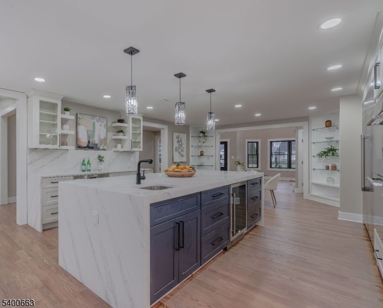 Interior, Kitchen, Marble Walls, Pendant Lights, Recessed Lighting, Wood Texture Flooring