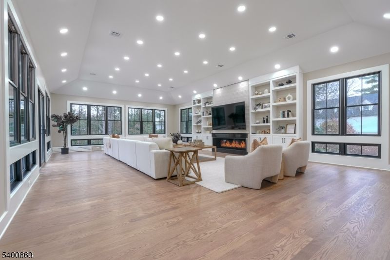 Fireplace, Interior, Living room, Recessed Lighting, Wood Texture Flooring