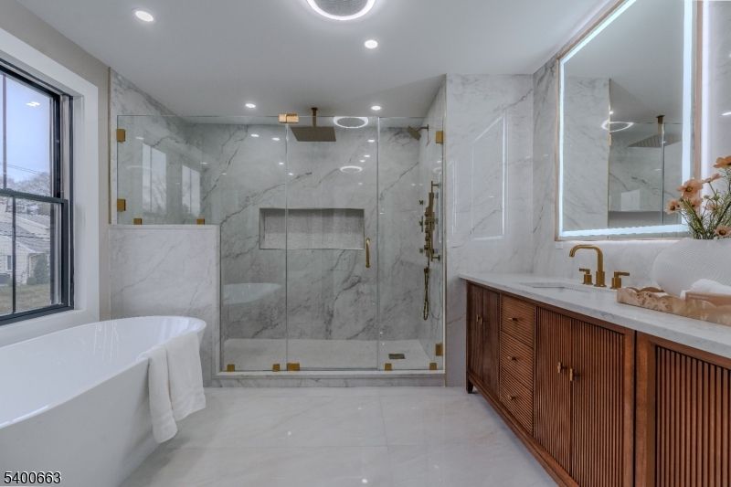 Bathroom, Free Standing Baths, Glass Shower, Interior, Marble, Marble Walls, Recessed Lighting