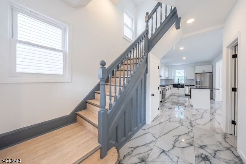 Interior, Kitchen, Marble, Recessed Lighting, Stainless Steel Appliances, Wood Texture Flooring