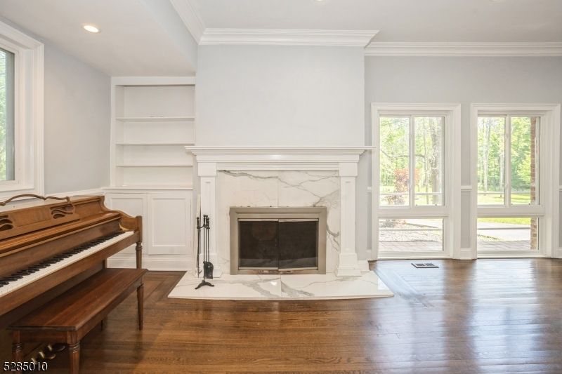 Fireplace, Interior, Piano, Recessed Lighting, Wood Texture Flooring