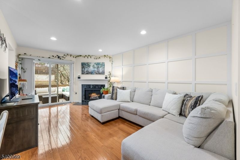 Fireplace, Interior, Living room, Recessed Lighting, Wood Texture Flooring