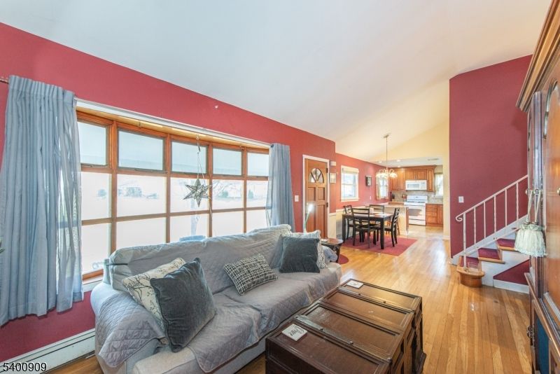 Chandelier, Dining room, Interior, Kitchen, Living room, Pendant Lights, Wood Texture Flooring