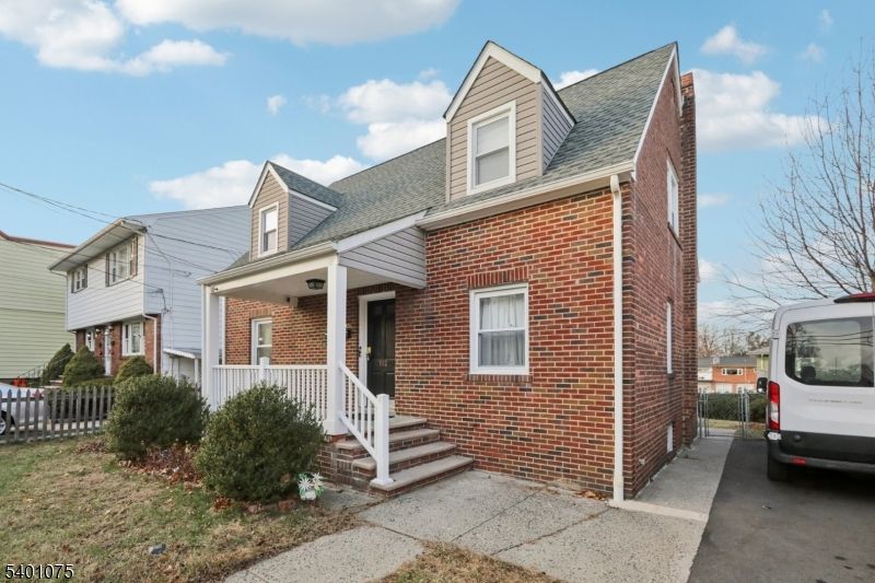 Exterior, Facade, Brick Facade, Cape Cod