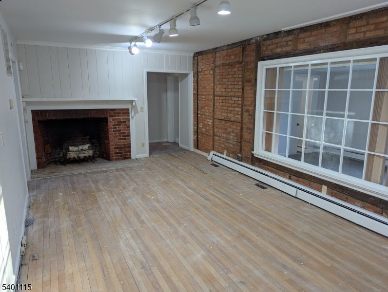 Empty room, Fireplace, Interior, Stone Walls, Wood Texture Flooring