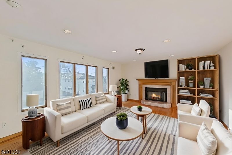 Fireplace, Interior, Living room, Recessed Lighting, Wood Texture Flooring