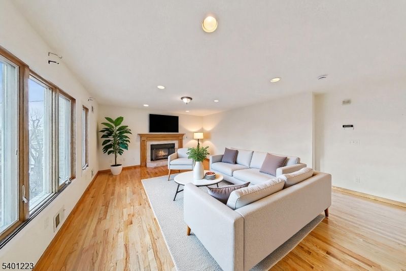 Fireplace, Interior, Living room, Recessed Lighting, Wood Texture Flooring