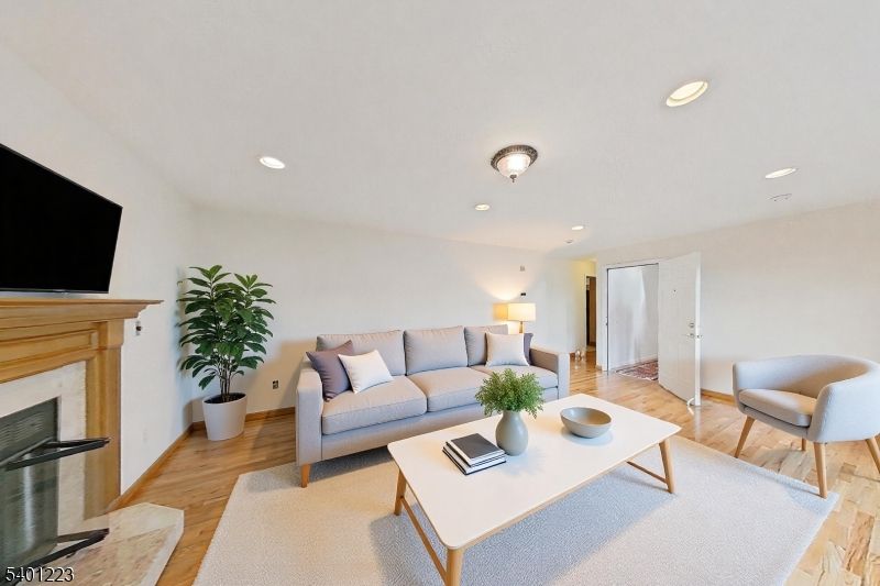 Fireplace, Interior, Living room, Recessed Lighting, Wood Texture Flooring