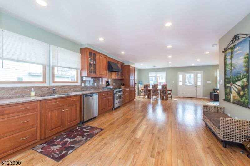 Dining room, Interior, Kitchen, Recessed Lighting, Stainless Steel Appliances, Wood Texture Flooring