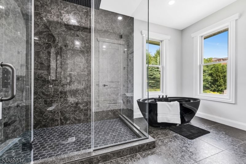 Bathroom, Free Standing Baths, Glass Shower, Interior, Marble Walls, Recessed Lighting
