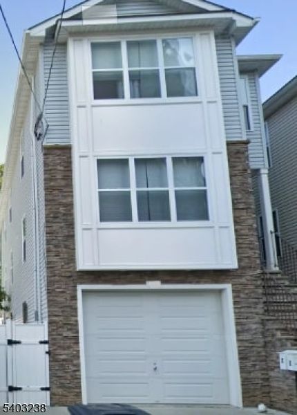 Attached, Exterior, Facade, Brick Facade, Rowhouse