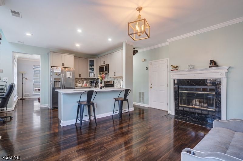 Fireplace, Interior, Kitchen, Pendant Lights, Recessed Lighting, Wood Texture Flooring