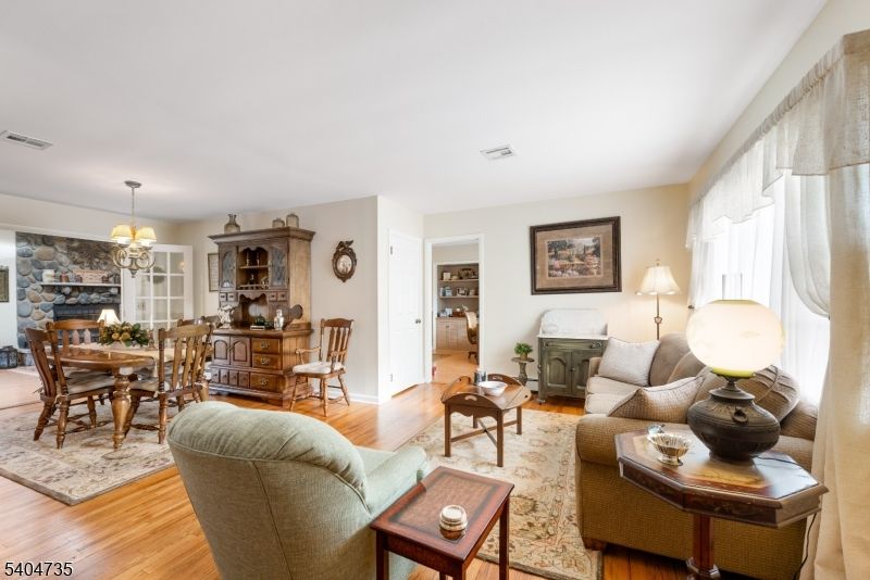 Chandelier, Dining room, Fireplace, Interior, Living room, Wood Texture Flooring