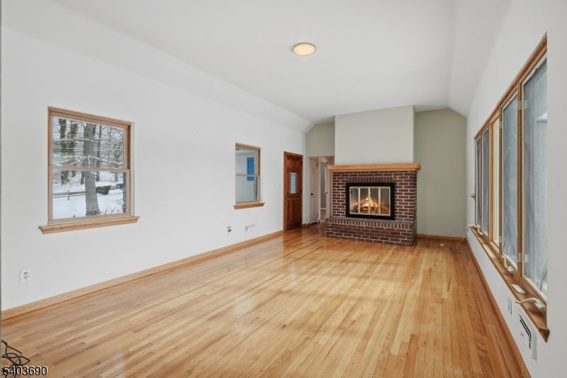 Empty room, Fireplace, Interior, Recessed Lighting, Wood Texture Flooring