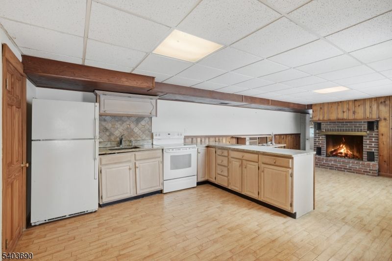 Fireplace, Interior, Kitchen, Recessed Lighting, Stone Walls, Wood Texture Flooring, Wooden Walls