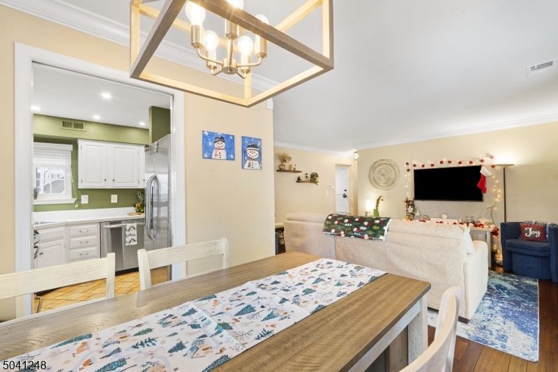 Chandelier, Dining room, Interior, Kitchen, Living room, Recessed Lighting, Wood Texture Flooring