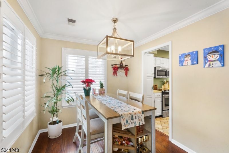 Dining room, Interior, Kitchen, Pendant Lights, Stainless Steel Appliances, Wood Texture Flooring
