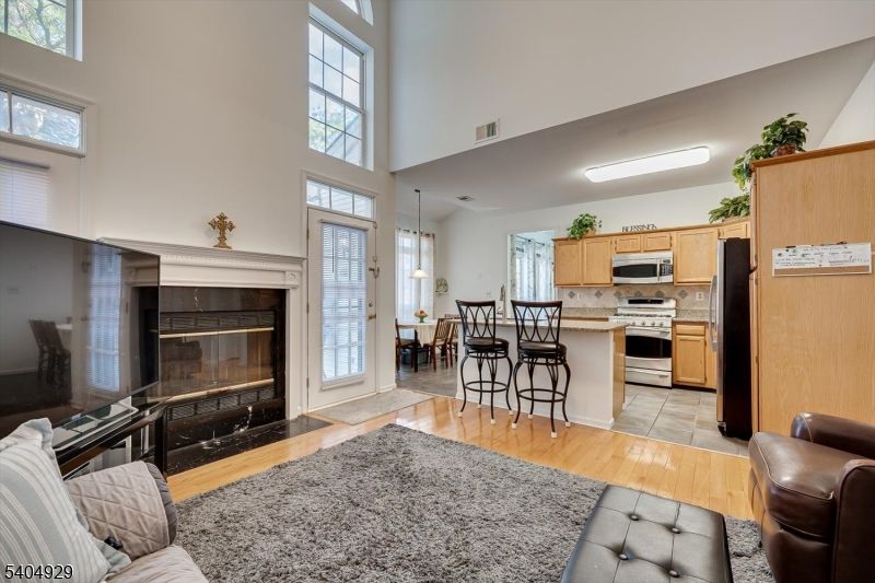 Dining room, Interior, Kitchen, Pendant Lights, Stainless Steel Appliances, Wood Texture Flooring