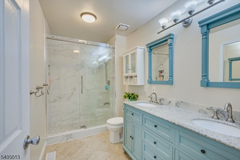 Bathroom, Dual Sink Vanities, Glass Shower, Interior, Marble Walls