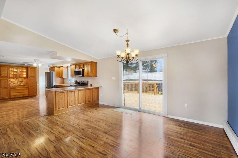 Chandelier, Empty room, Interior, Kitchen, Stainless Steel Appliances, Wood Texture Flooring