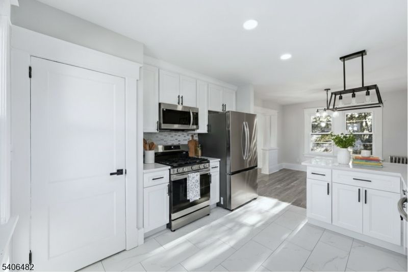 Interior, Kitchen, Marble, Pendant Lights, Recessed Lighting, Stainless Steel Appliances, Wood Texture Flooring