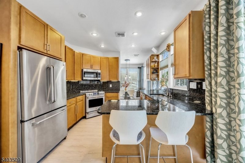 Chandelier, Interior, Kitchen, Recessed Lighting, Stainless Steel Appliances, Wood Texture Flooring