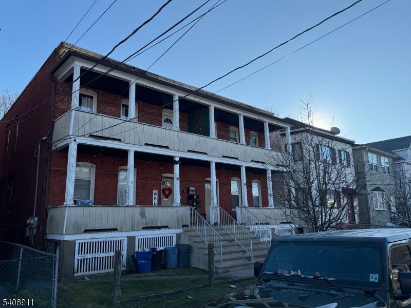 Exterior, Facade, Brick Facade, American Foursquare