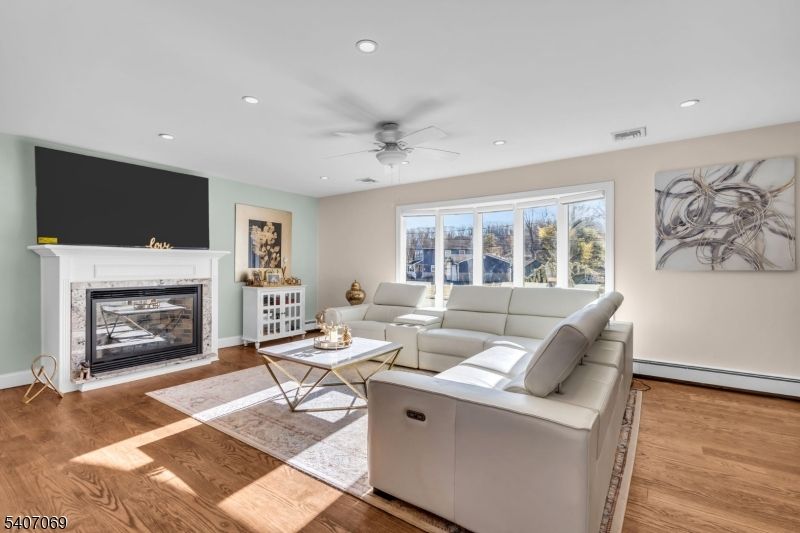 Fireplace, Interior, Living room, Recessed Lighting, Wood Texture Flooring