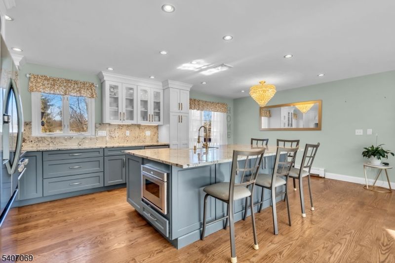 Chandelier, Interior, Kitchen, Recessed Lighting, Stainless Steel Appliances, Wood Texture Flooring